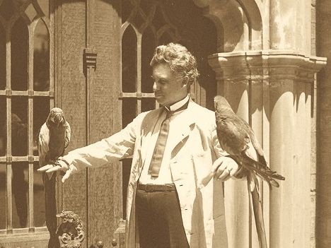 Master of the Inn Frank Miller with his beloved Macaws